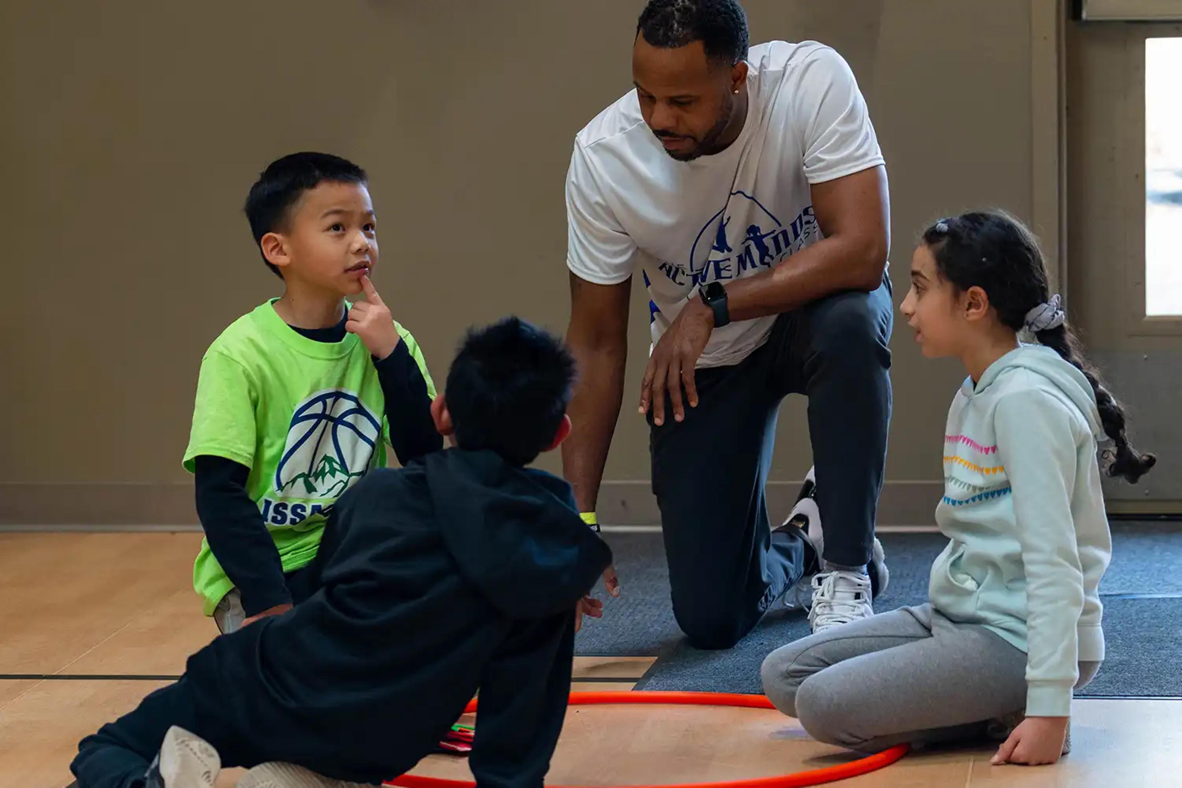 An AMC instructor with two participants